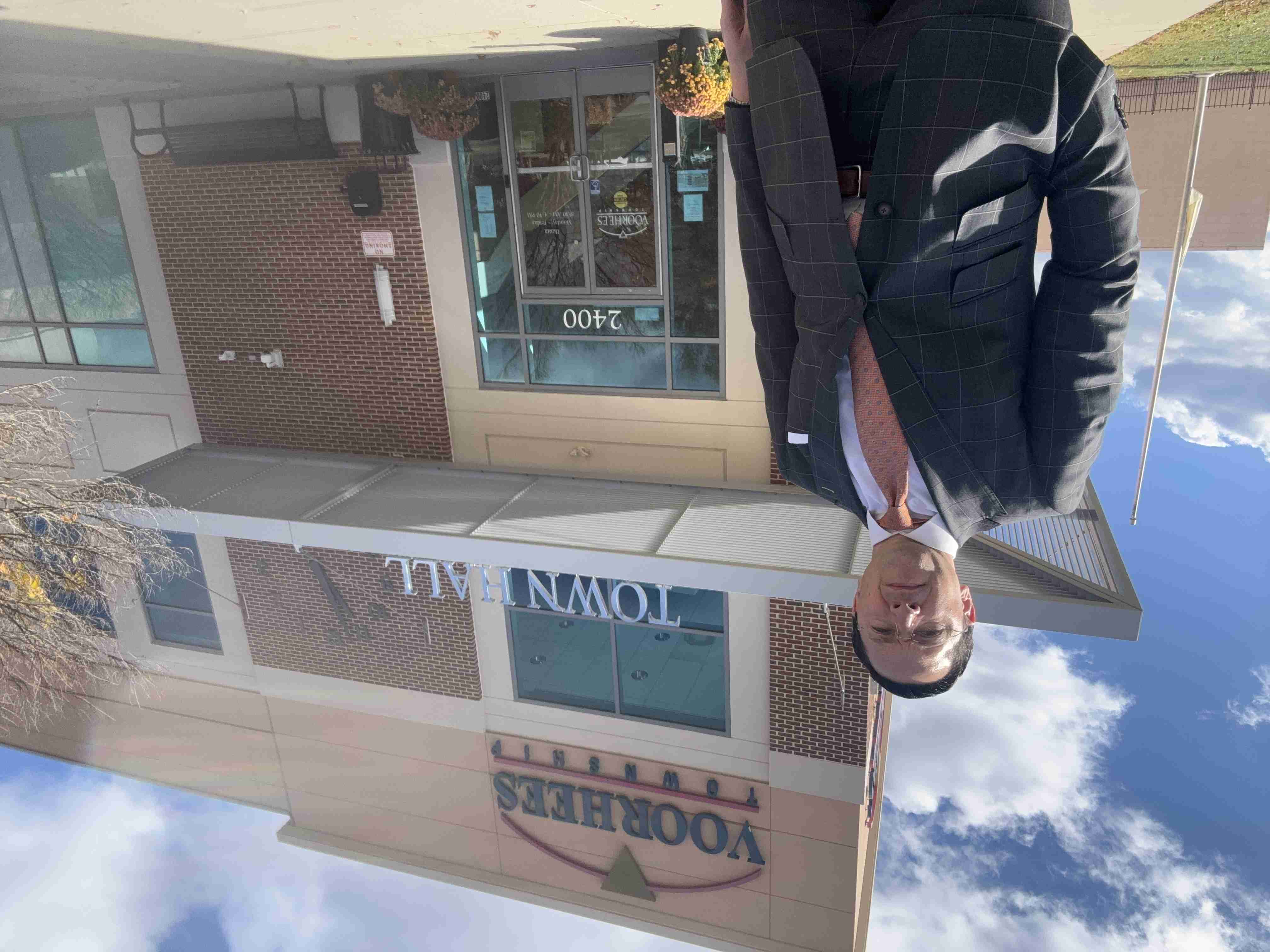 image of dan rosenberg standing in front of the voorhees town hall