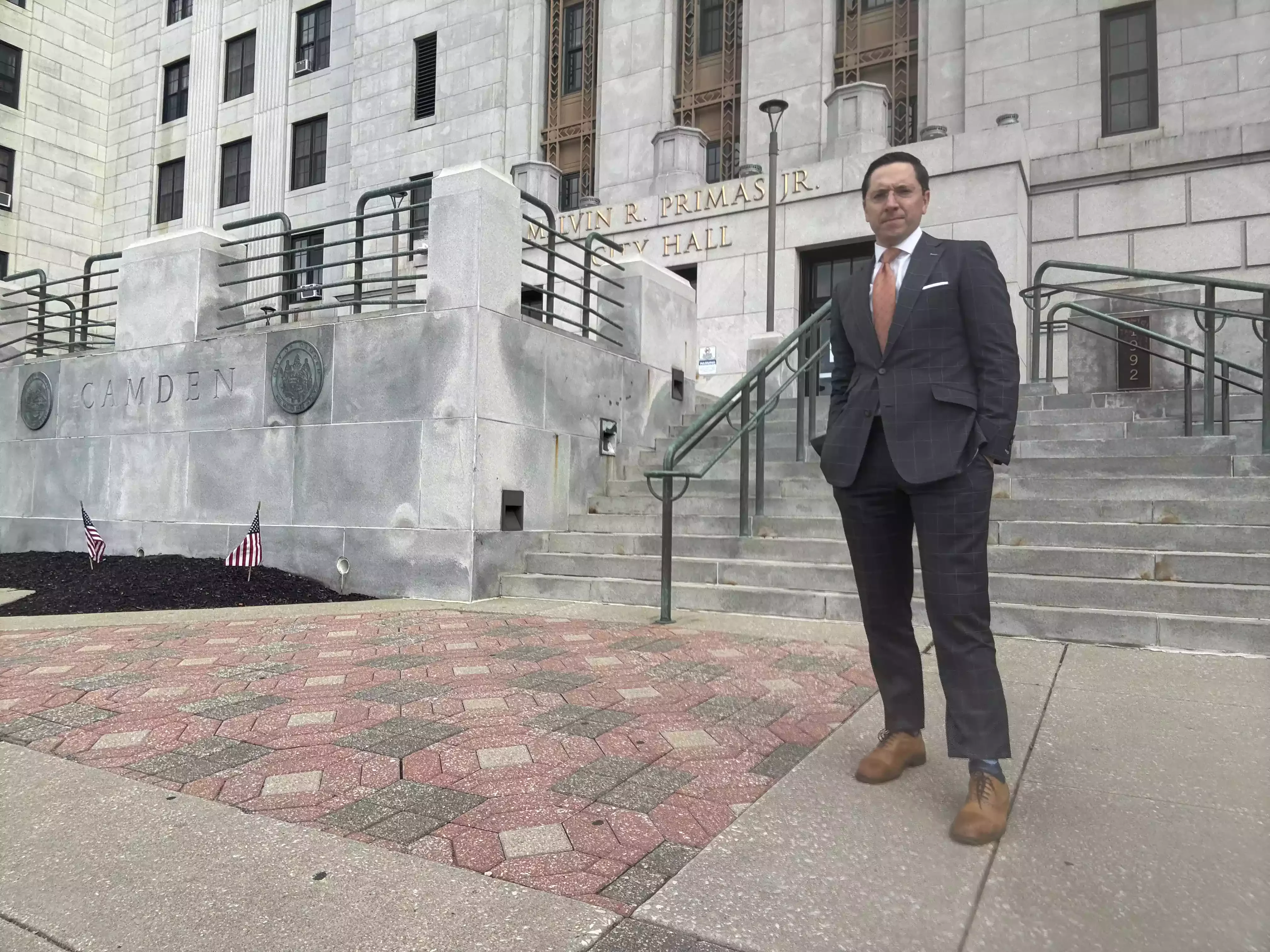 Dan Rosenberg of Rosenberg | Perry & Associates standing in front of Camden City Hall